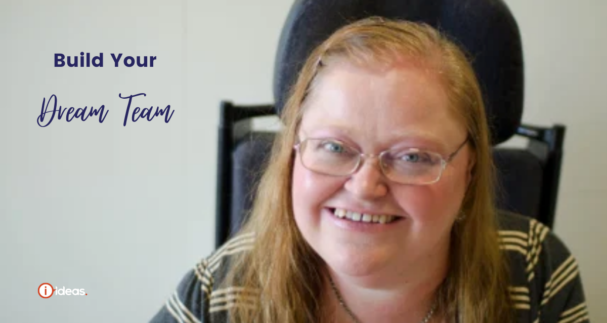 Woman seated in wheelchair smiling - words say build your dream team 