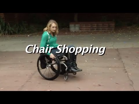 Lady on sidewalk in wheelchair