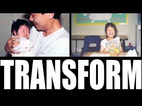 Man holding a new born baby and the word transform written across the bottem