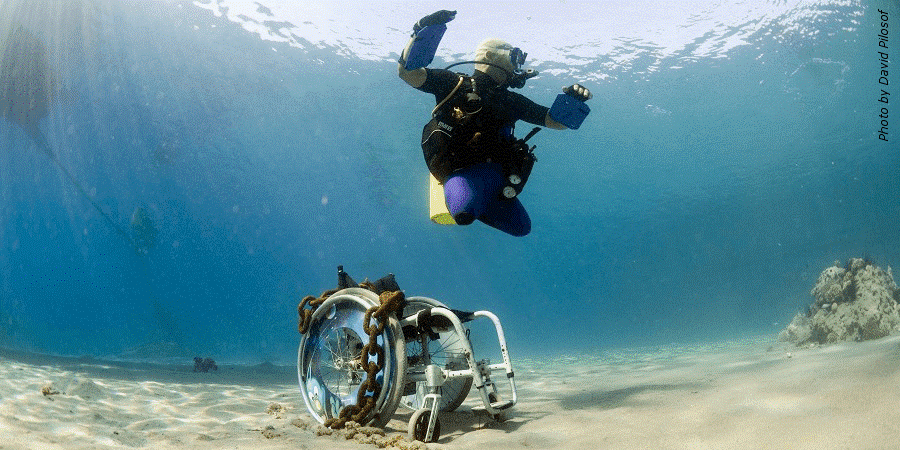 Person with a disability participating in adaptive scuba diving