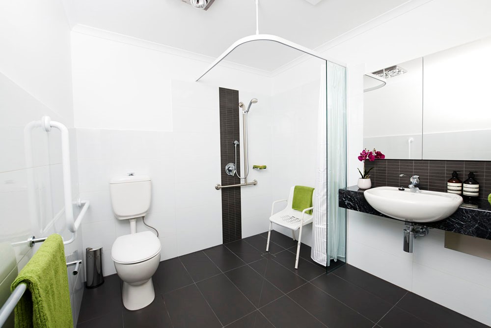 Modified bathroom with non-slip tiles, design and functionality are at the forefront of this bathroom. 